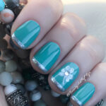 Mint Green St. Patrick's Day Nails with Sparkly Metallic Silver French